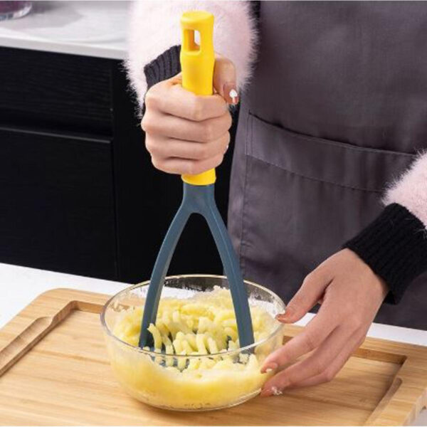 Hand Held Potato Masher With Handle.